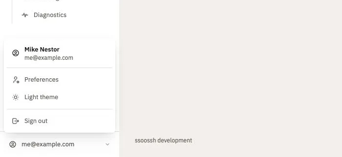 The identity row’s drop-up menu open over the rail: the signed-in name and email, which open the account page, then Preferences, the theme switch and Sign out